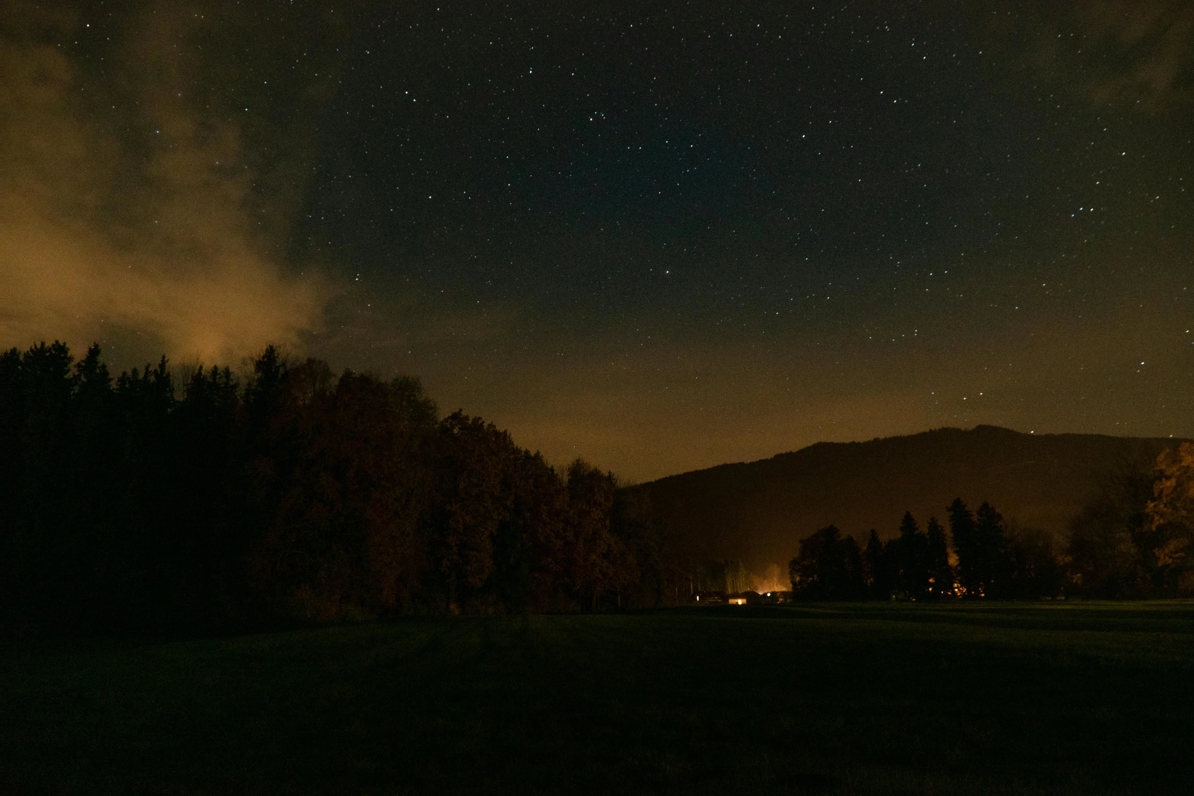 a field with trees and a mountain in the background, by Sebastian Spreng, pexels contest winner, sky night, rectangle, brown, 4k)