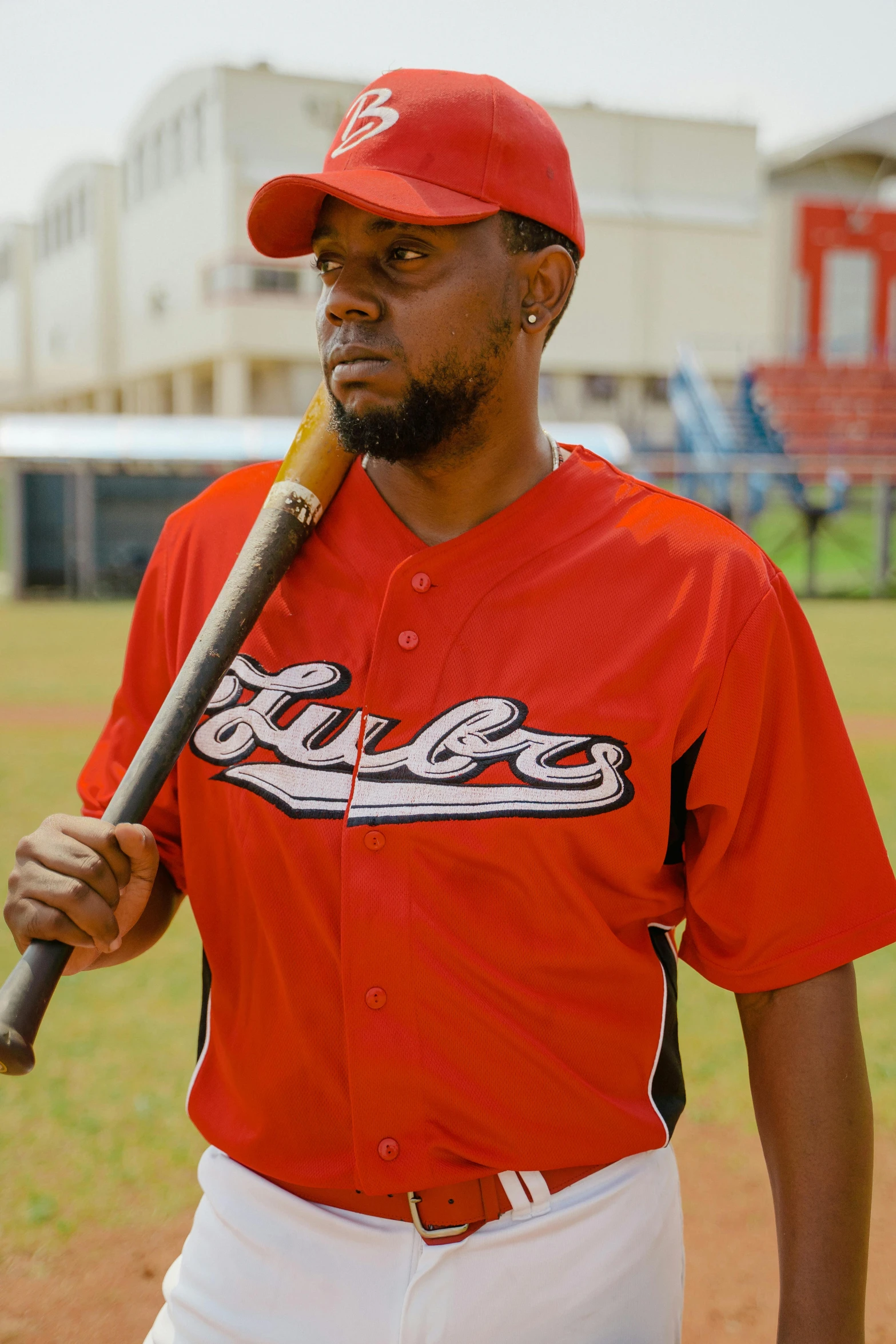 a baseball player holding a bat on a field, pexels contest winner, les nabis, african canadian, cuba, square, ( ( theatrical ) )