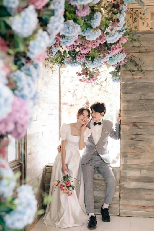 a man and a woman standing next to each other, a picture, by Gang Se-hwang, unsplash, romanticism, floral environment, cute elegant pose, slide show, window