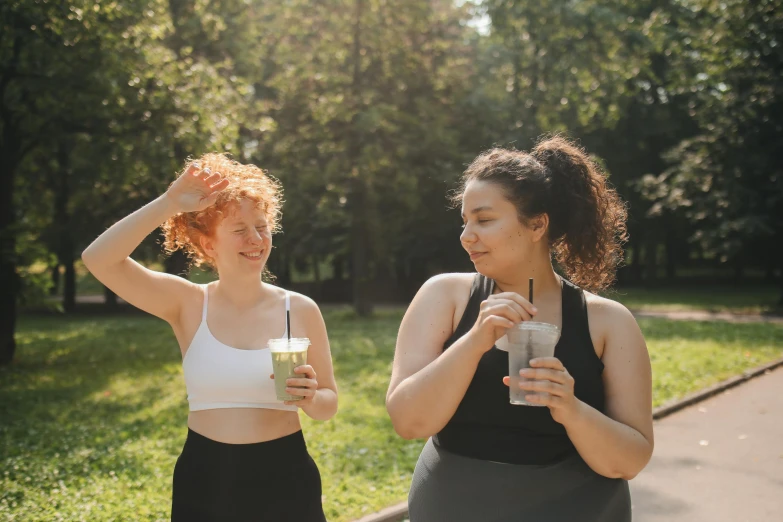 a couple of women standing next to each other, trending on pexels, hydration, cottagecore!! fitness body, avatar image, ( redhead