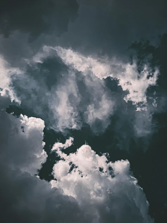 a black and white photo of a cloudy sky, an album cover, inspired by Elsa Bleda, unsplash, surrealism, ilustration, trending photo, heavens