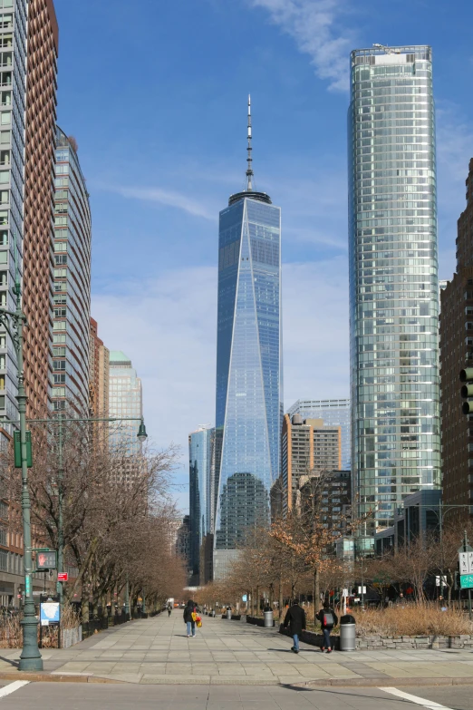 a city street filled with lots of tall buildings, world trade center twin towers, daniel libeskind, photo taken in 2018, sweeping vista