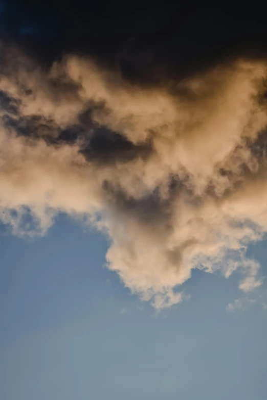 a jetliner flying through a cloudy blue sky, an album cover, unsplash, precisionism, dark mammatus cloud, late summer evening, thick pigmented smoke, ignant