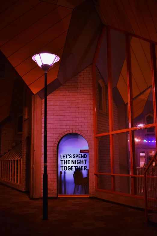 there is a neon sign that says let's see the night i fall asleep, a photo, by Jan Tengnagel, interactive art, an archway, red building, grown together, aardman studios