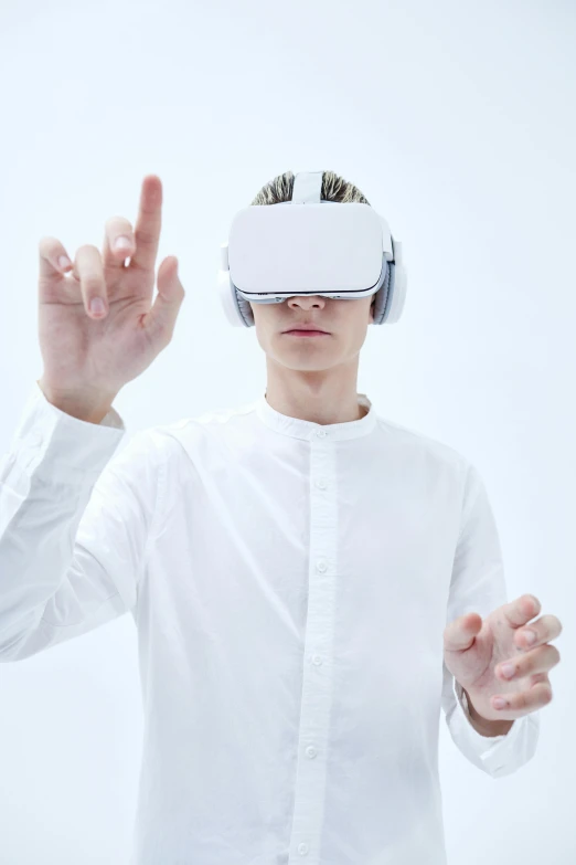 a man in a white shirt wearing a virtual reality headset, inspired by Oskar Lüthy, triumphant pose, instagram post, videogame still, white