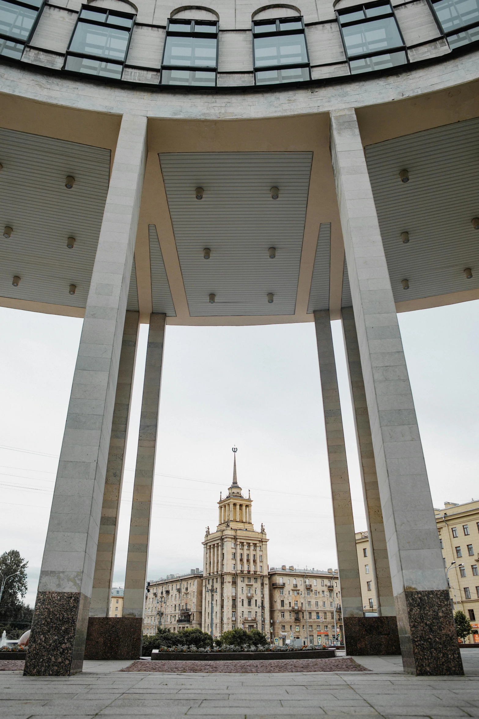 the inside of a building with columns and a dome, inspired by György Rózsahegyi, socialist realism, golden towers, square, photographed for reuters, tula