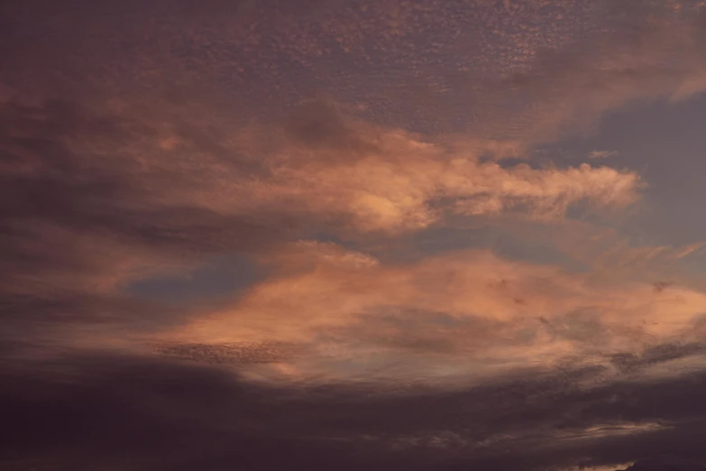 there is a plane that is flying in the sky, inspired by Elsa Bleda, pexels contest winner, tonalism, soft light 4 k in pink, layered stratocumulus clouds, today\'s featured photograph 4k, sky night