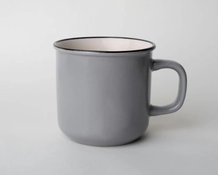 a close up of a cup on a table, light grey, enamel, grey backdrop, full product shot