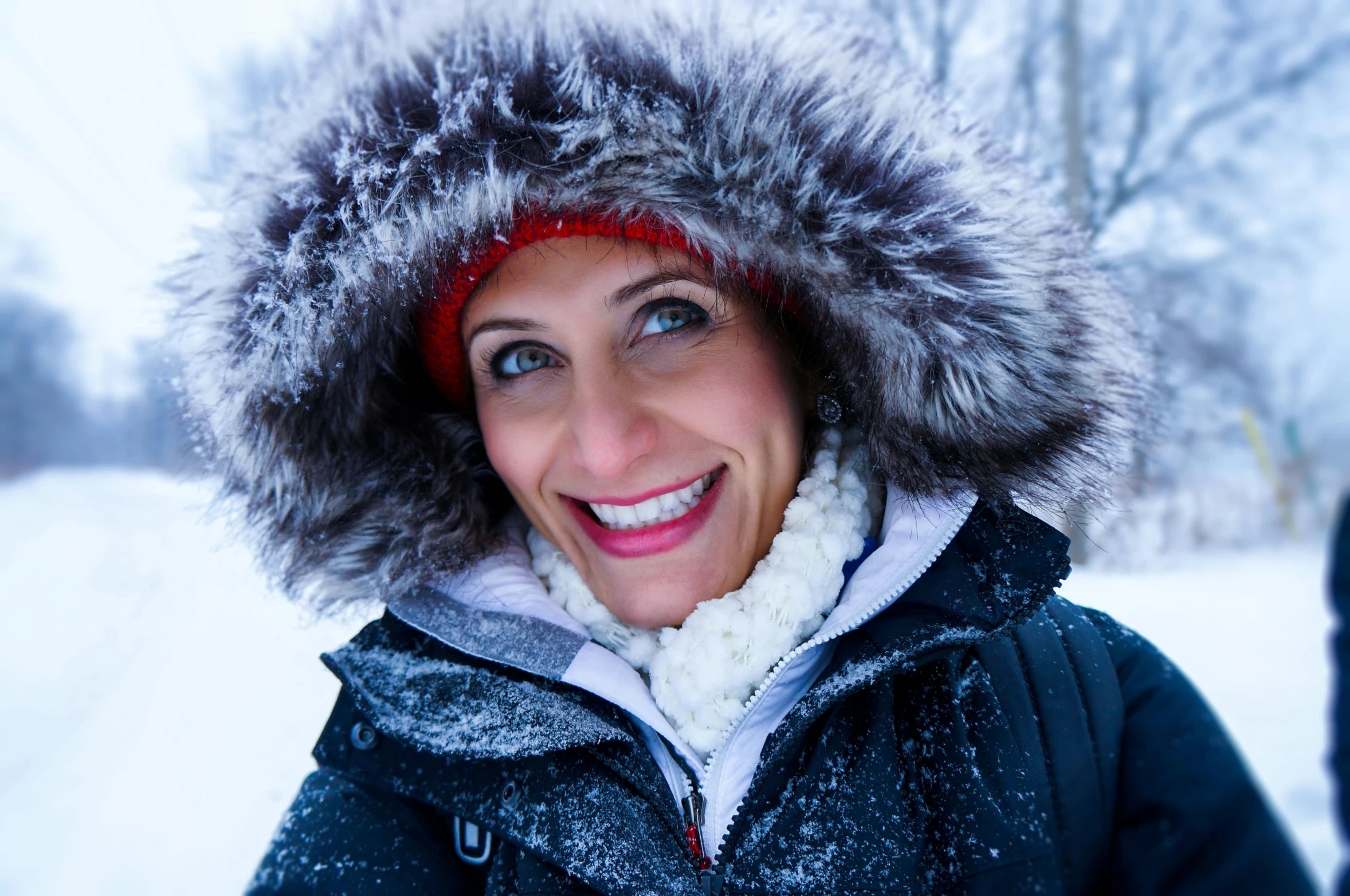 a woman that is standing in the snow, a portrait, pexels, goofy smile, portrait of kim wexler, medium closeup shot, nancy grossman