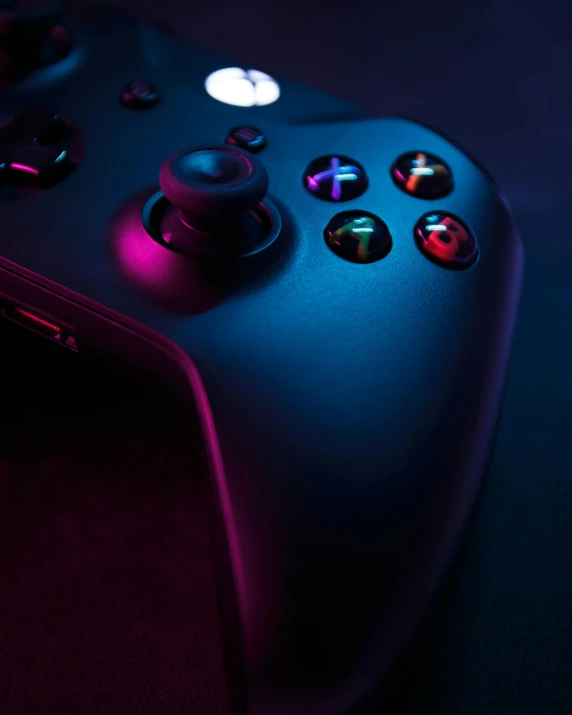 a close up of a video game controller, unsplash, purple color lighting, xbox series x, instagram photo, lgbtq