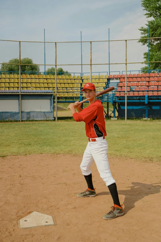 a man holding a baseball bat on top of a field, high-quality photo, 15081959 21121991 01012000 4k, power stance, aged 13