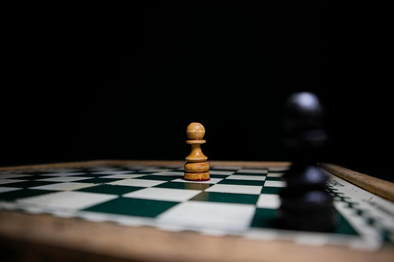 a chess board with a chess piece on it, by Jesper Knudsen, unsplash, realism, fan favorite, standoff, instagram picture, arms crossed