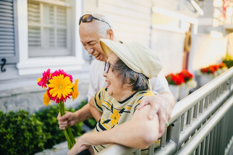 a man giving a woman a bunch of flowers, pexels contest winner, nursing home, avatar image, exterior shot, taejune kim