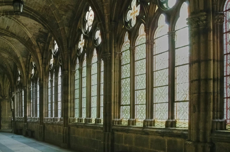 a long hallway with lots of windows and a clock on the wall, inspired by Barthélemy d'Eyck, pexels contest winner, gothic stained glass style, gothic arch frame, steel window mullions, stained”