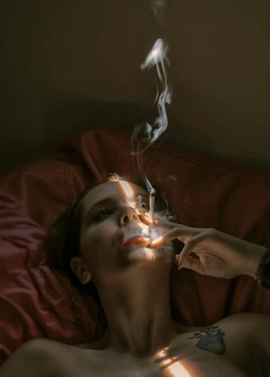 a woman laying on a bed with a cigarette in her mouth, inspired by Elsa Bleda, pexels contest winner, hyperrealism, smoking a bowl of hash together, hunter biden smoking crack, fan favorite, profile image