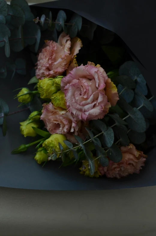 a bunch of flowers sitting on top of a table, gushy gills and blush, dark grey, close up details, award - winning