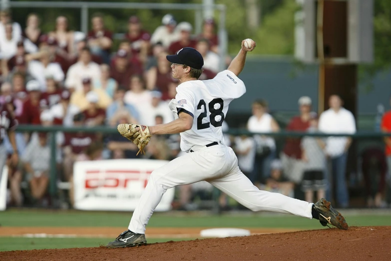 a baseball player pitching a ball on top of a field, a photo, cobra, taken in the 2000s, college, tournament, david bates