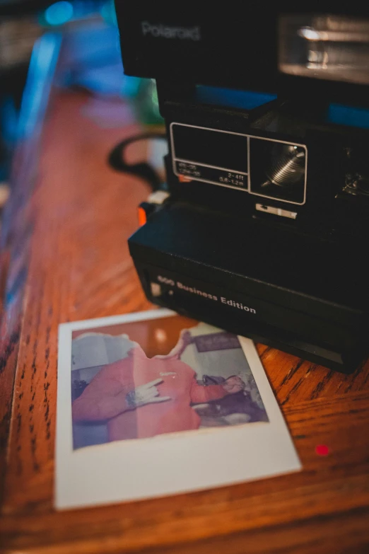 a polar polar polar polar polar polar polar polar polar polar polar polar polar polar polar polar polar polar polar polar polar polar polar polar polar polar polar, a polaroid photo, inspired by Nan Goldin, unsplash, happening, on a wooden table, holding polaroid camera, photo from the 80s