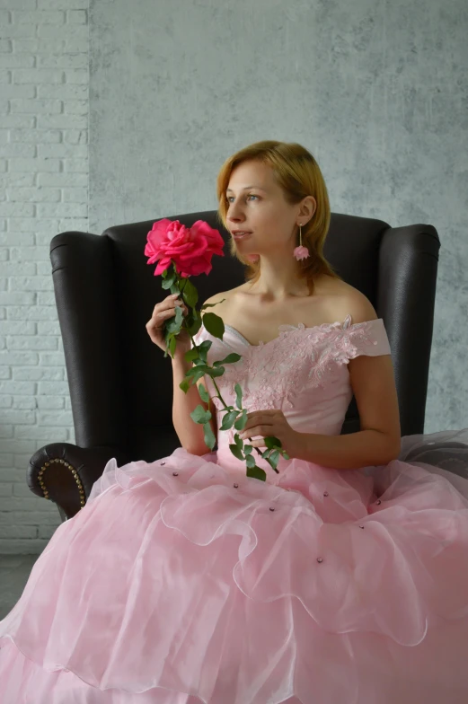 a woman sitting in a chair with a rose in her hand, inspired by Alexander Roslin, pixabay contest winner, romanticism, brilliant pink ball gown, russian girlfriend, costume design made with love, profile image