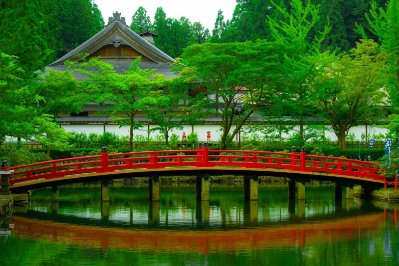 a red bridge over a body of water, pexels contest winner, ukiyo-e, green terrace, in front of a temple, 2 0 0 0's photo, in karuizawa