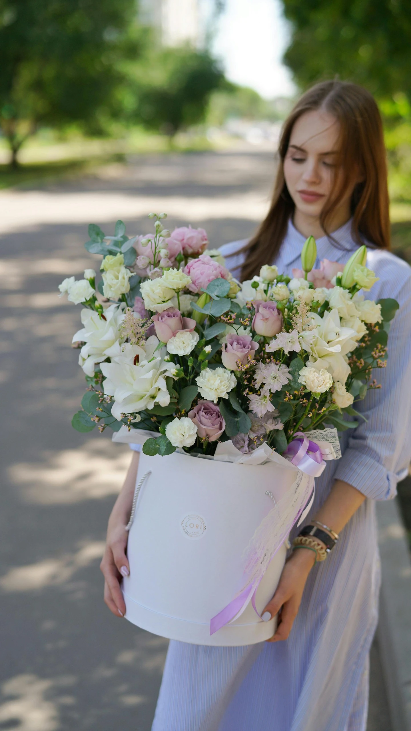 a woman holding a white bucket filled with flowers, in pastel shades, delicious, ekaterina, huge success