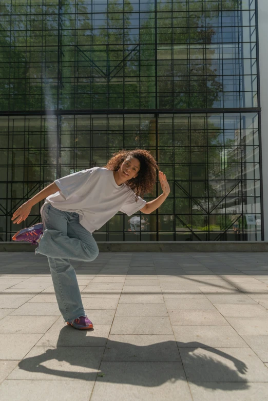 a woman is doing a trick on a skateboard, by Nina Hamnett, happening, issey miyake, promotional image, student, he is dancing