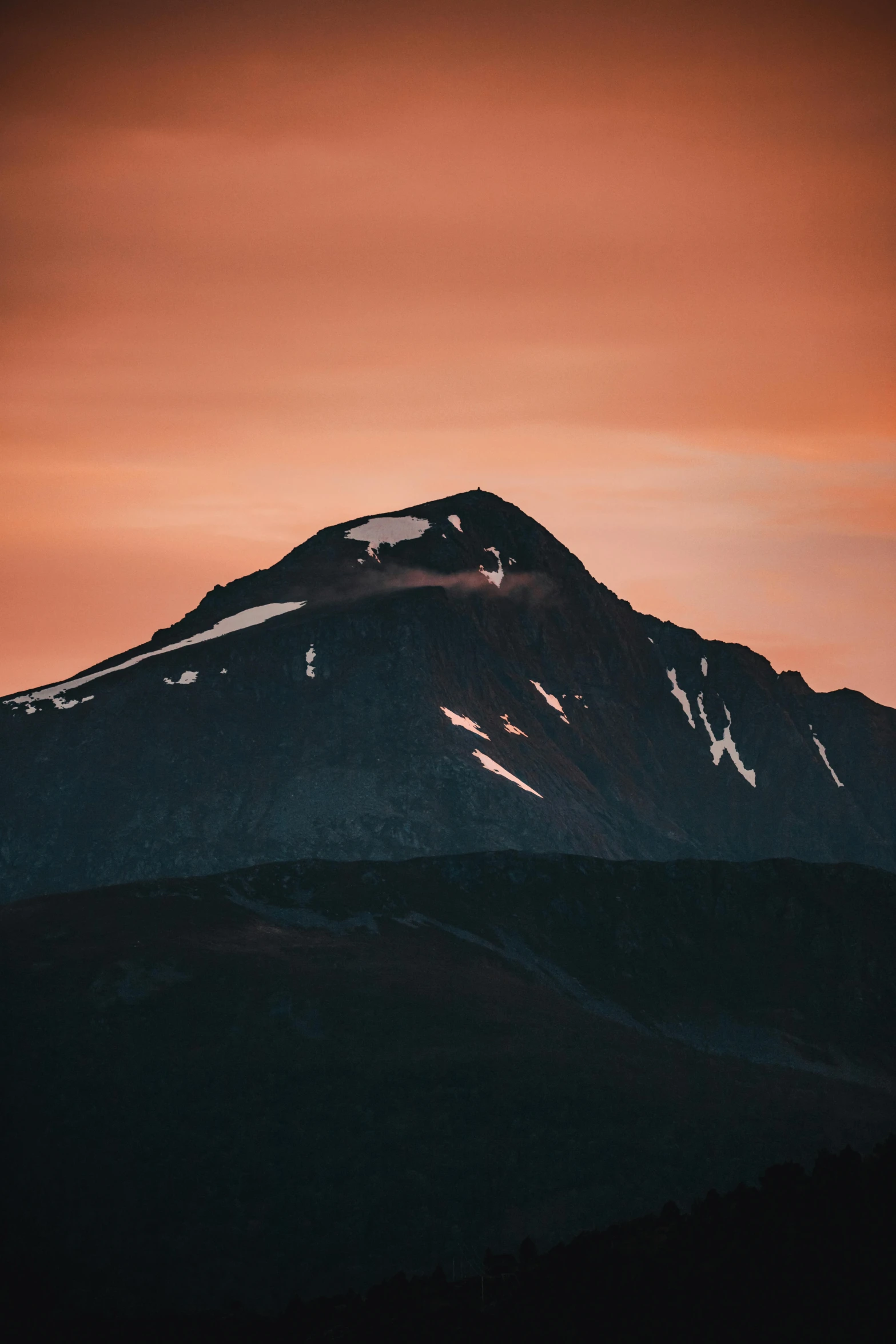 a mountain covered in snow at sunset, a picture, unsplash contest winner, hurufiyya, volcanic background, late summer evening, minimalistic aesthetics, brown