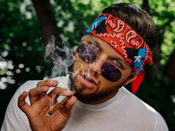 a man with a bandana smoking a cigar, trending on pexels, trippy mushroom, thick glasses, young man, smoking body