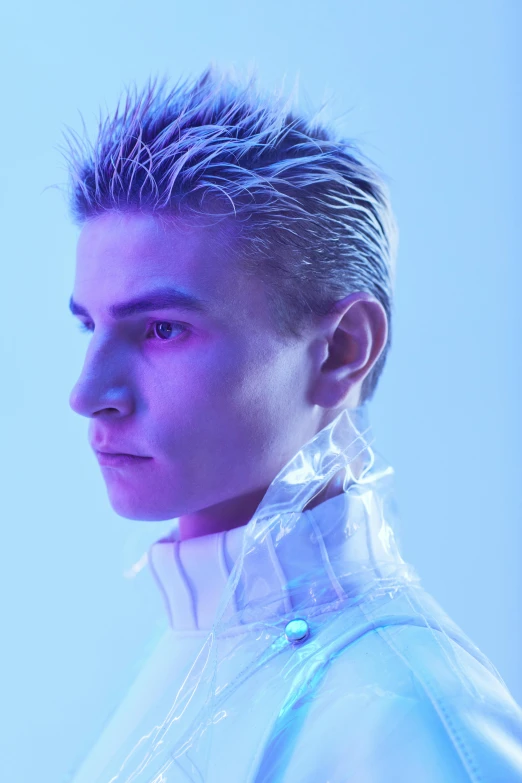 a close up of a person with short hair, inspired by Kristian Kreković, trending on reddit, holography, wearing futuristic clothing, tommy 1 6 years old, slicked-back hair, gel spiked blond hair