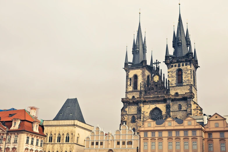 a group of people that are standing in front of a building, by Matija Jama, pexels contest winner, baroque, black domes and spires, square, pastel', panoramic