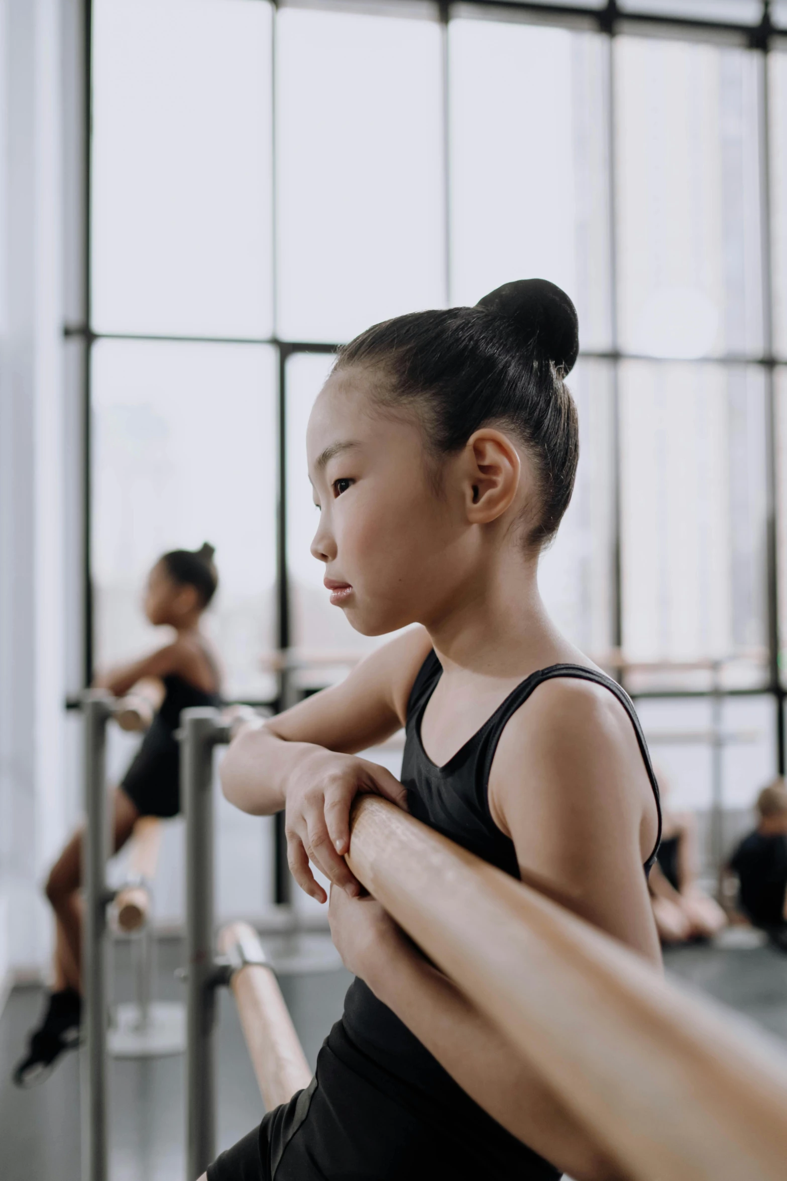 a little girl in a black leo leo leo leo leo leo leo leo leo leo leo leo, by Joseph Severn, pexels contest winner, arabesque, a young asian woman, working out, contemplating, gif