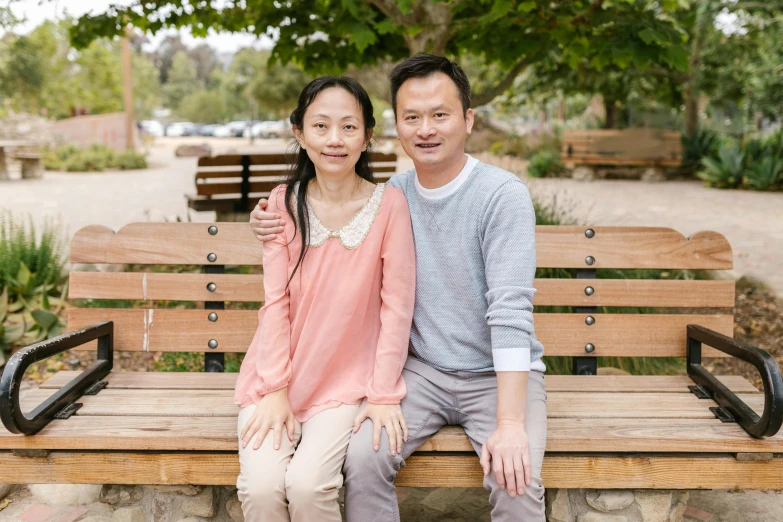 a man and woman sitting on a wooden bench, louise zhang, portrait image, 4 5 yo, 15081959 21121991 01012000 4k