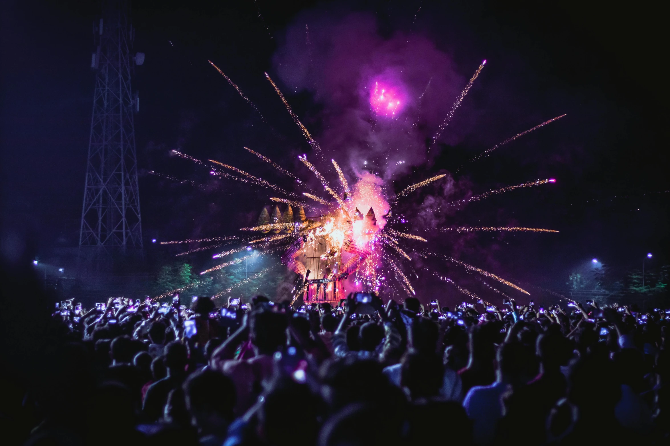 a crowd of people watching a fireworks show, by Niko Henrichon, wild rave outfit, lee madgwick & liam wong, profile image