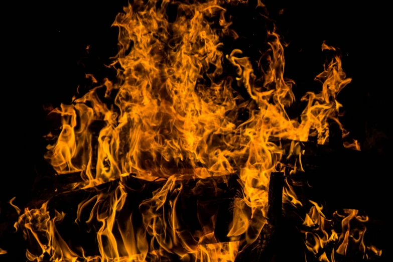 a close up of a fire on a black background, pexels, avatar image, thumbnail, burning village, full frame image