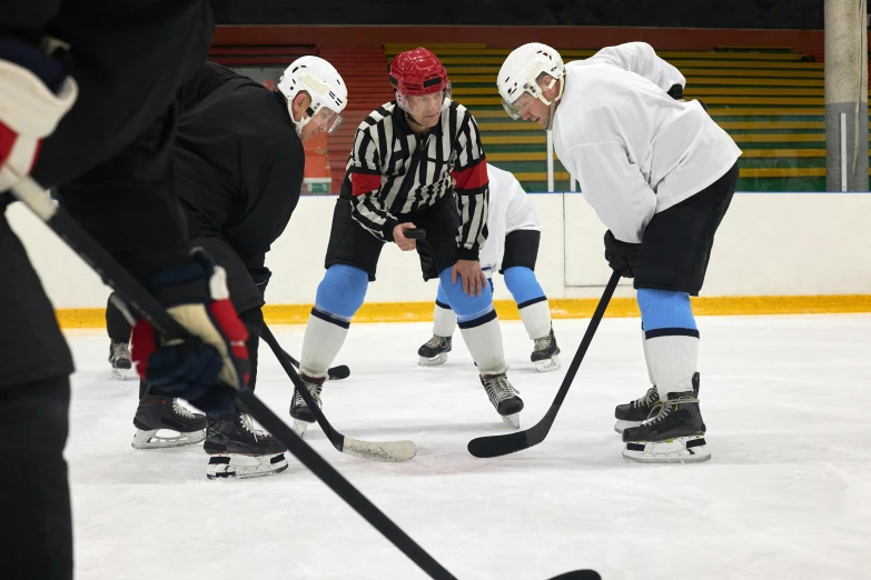 a group of people playing a game of hockey, face to face, lynn skordal, tention, 8k octan photo