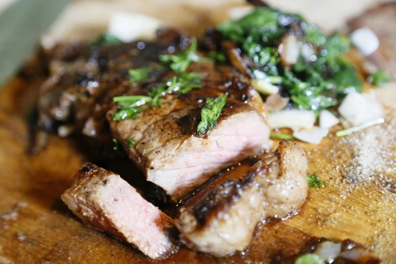 a wooden cutting board topped with meat and vegetables, a portrait, by Alice Mason, unsplash, in chippendale sydney, steak, profile image, malaysian