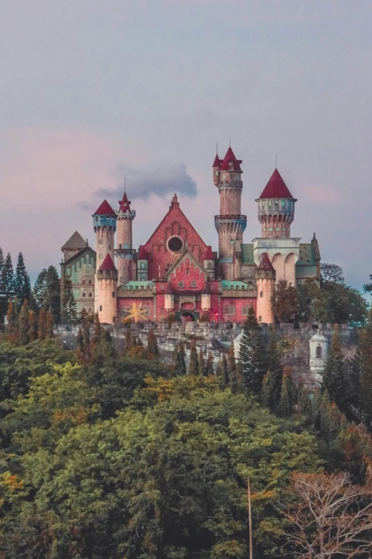 a castle sitting on top of a lush green hillside, inspired by Mike Winkelmann, unsplash contest winner, renaissance, pink, colorful architecture, epic castle with tall spires, german forest