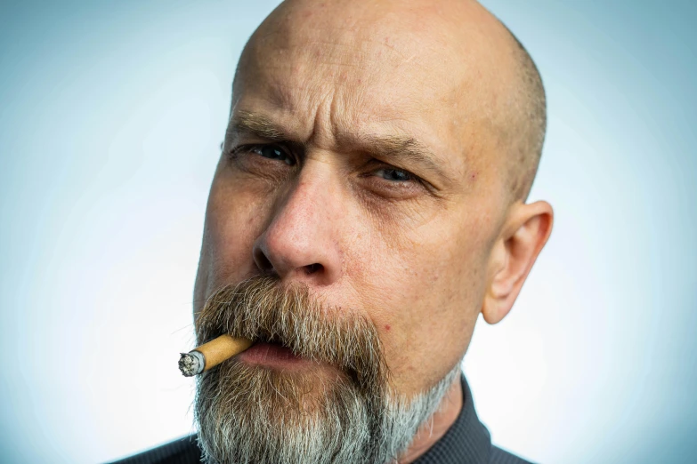 a man with a beard and a cigarette in his mouth, featured on reddit, hyperrealism, bald, a salt&pepper goatee, promo photo, tim booth