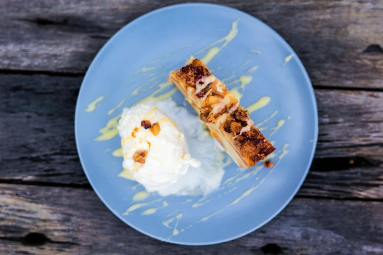 a close up of a plate of food on a table, by Lee Loughridge, apple pie, blue sky, square, plating