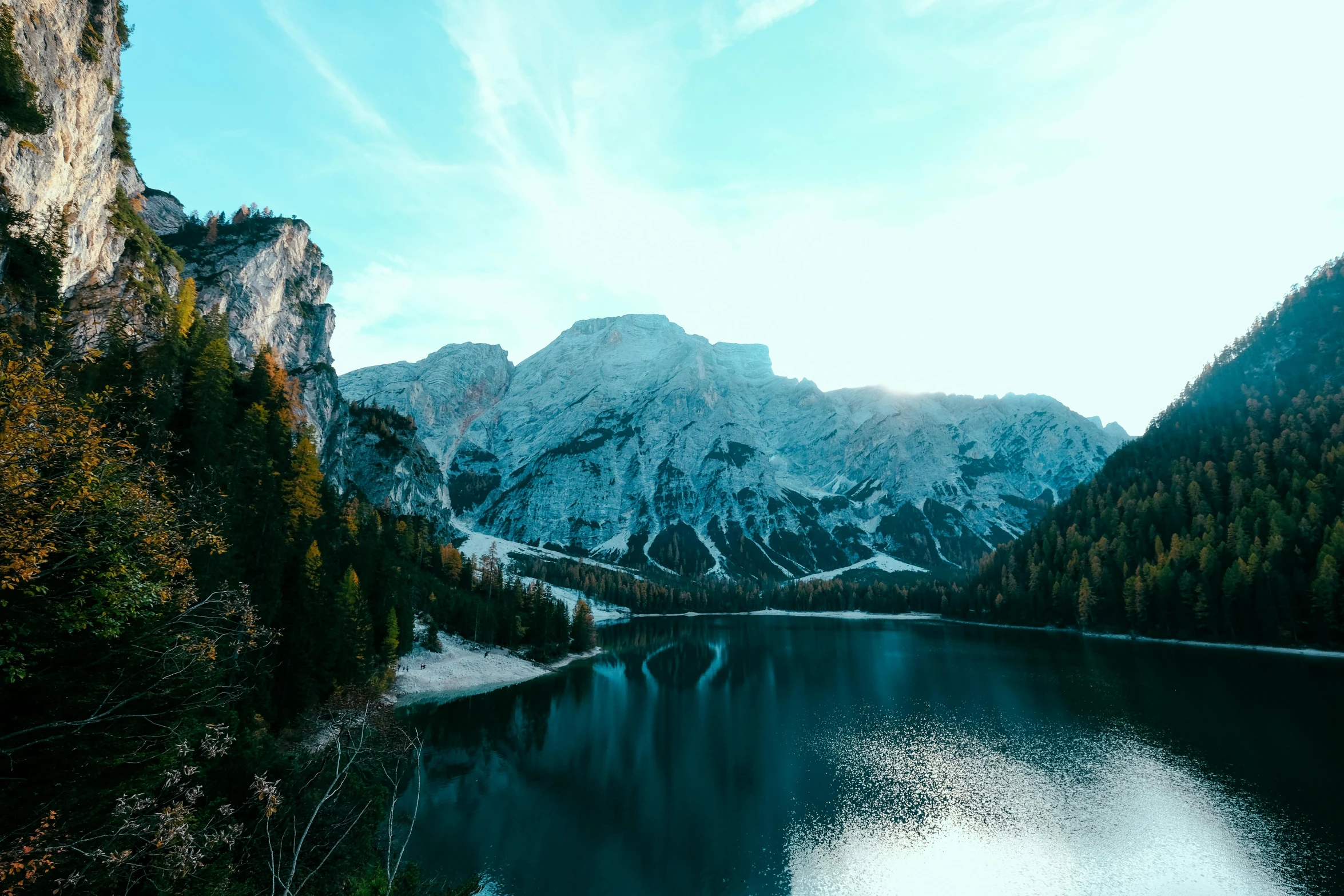 a lake with a mountain in the background, pexels contest winner, fan favorite, dolomites, body of water, slight glow