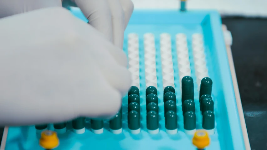 a close up of a person putting pills on a tray, clone laboratory, tubes, thumbnail, unbeatable quality