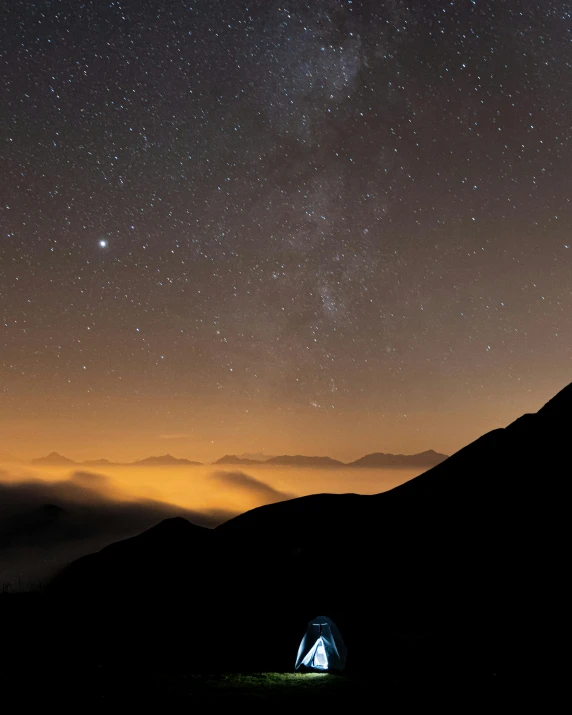 a tent sitting on top of a mountain under a night sky, pexels contest winner, sitting on the cosmic cloudscape, brown, profile picture, snapchat photo