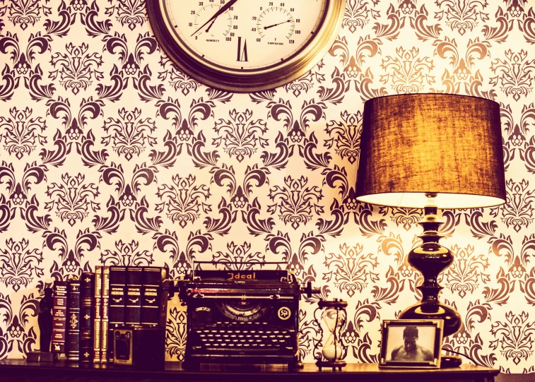 a clock sitting on top of a shelf next to a lamp, an album cover, by Konrad Witz, trending on pixabay, maximalism, damask pattern, sepia, background 1970s office, gentleman's club lounge