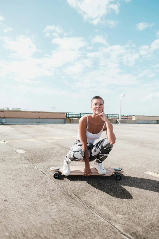 a man sitting on a skateboard in a parking lot, portrait sophie mudd, promotional image, ::