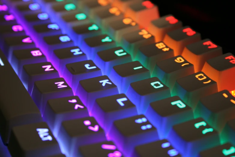 a close up view of a computer keyboard, a digital rendering, pexels, colourful lighting, unreal engine style, avatar image, multicoloured