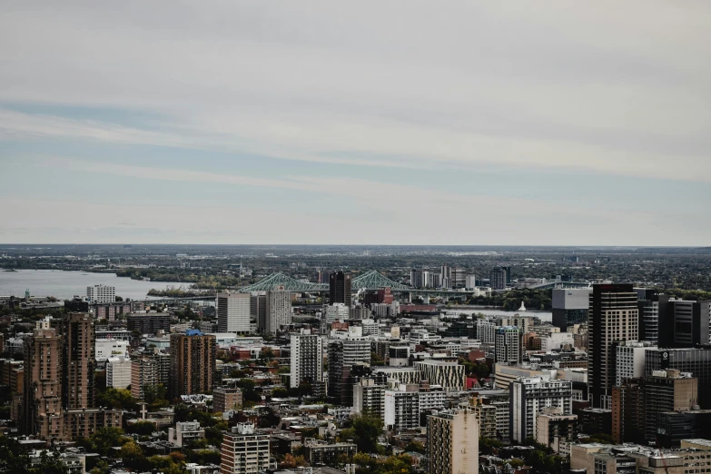 a view of a city from the top of a building, montreal, 1 petapixel image, slight overcast weather, slide show