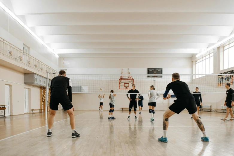 a group of young men playing a game of volleyball, unsplash contest winner, danube school, high ceilings, profile image, thumbnail