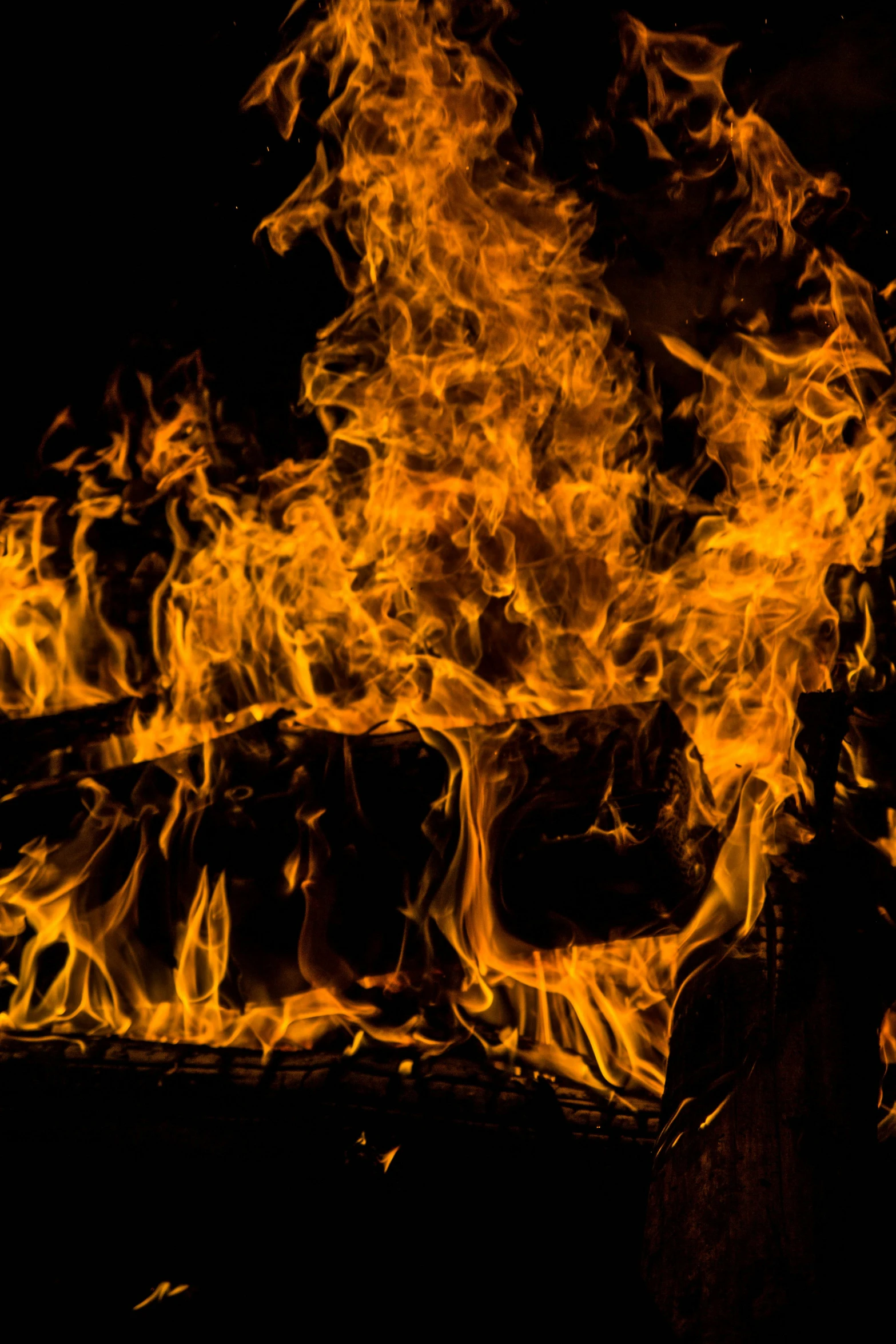 a person standing in front of a fire, pexels, avatar image, dynamic closeup, full frame image, print ready