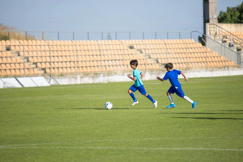 a group of young men playing a game of soccer, trending on dribble, ameera al-taweel, forward facing, 15081959 21121991 01012000 4k, square