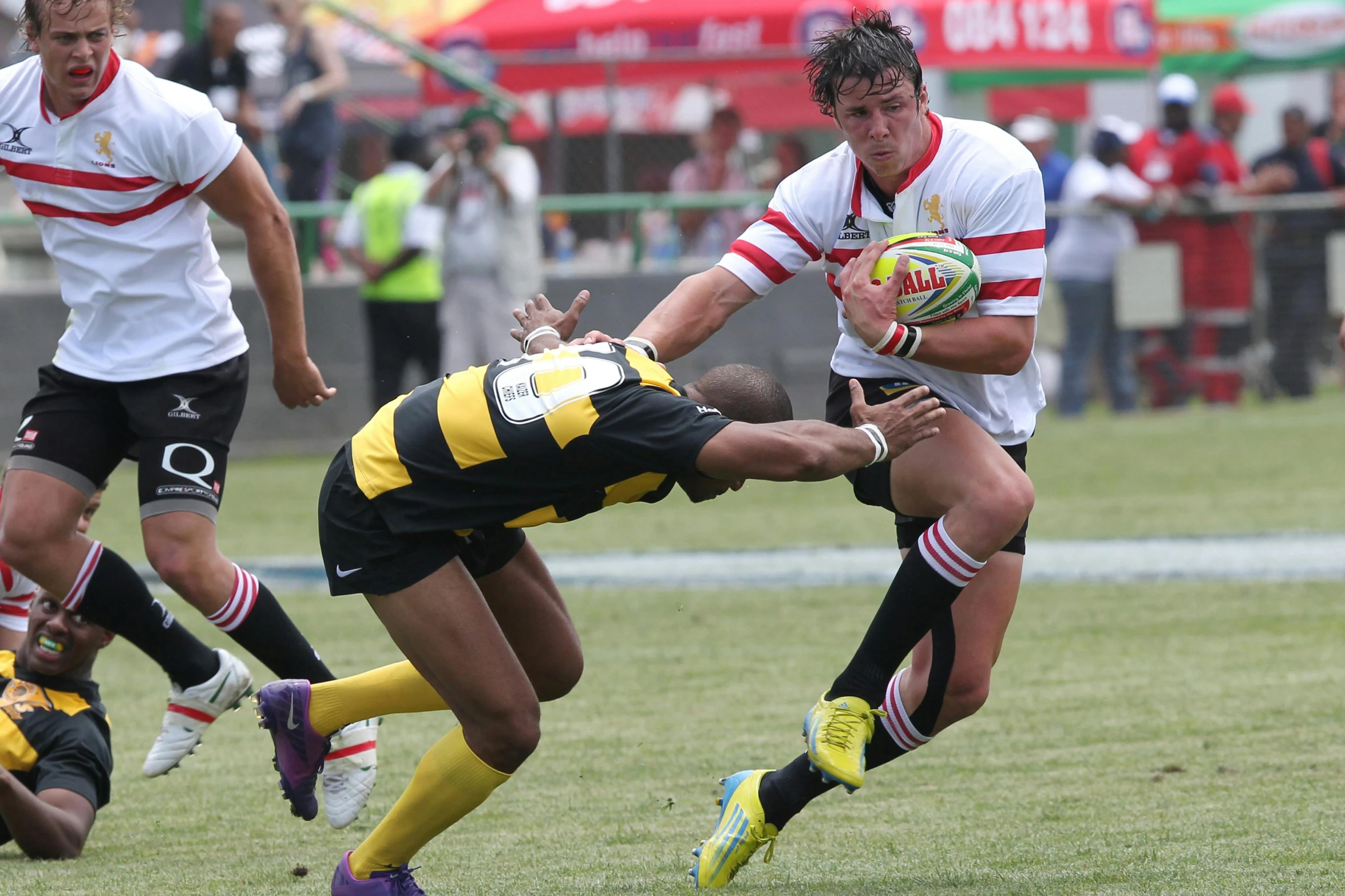 a group of men playing a game of rugby, ruan jia and mandy jurgens, 4k photo”, tournament, close body shot
